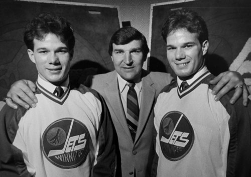 Winnipeg Free Press / Archive Photo/ May 29 1984 - Jets GM John Ferguson  signs twin brothers  left Paul and right Perry Pooley  at newser  Photo Book Project - Wpg Winnipeg Jets Hockey Club - NHL National Hockey League return -  ( kgjets brings up all Wpg Jets recovered photos in Merlin )  photos cannot be  published without written permission from the Winnipeg Free Press and credit must include  the Winnipeg Free Press and photographer with each photo