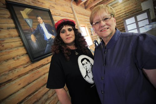 Winnipeg, Manitoba - June 11, 2011 -  Nancy Fluto (R), President of St. James-Assiniboia Pioneer Association and Sandra Horyski, the great, great niece of Cuthbert Grant pose for a photo in front of a portrait of Grant in the Grant's Old Mill in Winnipeg Saturday, June 10, 2011. The portrait was unveiled at a ceremony today. (John Woods/Winnipeg Free Press)
