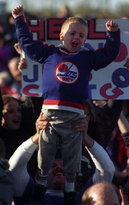 Winnipeg Free Press / Joe Bryksa / May 16 1995 - COLOUR PIC - Save  the  Jets Rally at the Forks 30,000 people attended including  this little guy - Photo Book Project - Wpg Winnipeg Jets Hockey Club - NHL National Hockey League return -  ( kgjets brings up all Wpg Jets recovered photos in Merlin new book project pics will have slug newjets  for archive pics put in after june 7 2011 )  photos cannot be  published without written permission from the Winnipeg Free Press and credit must include  the Winnipeg Free Press and photographer with each photo -