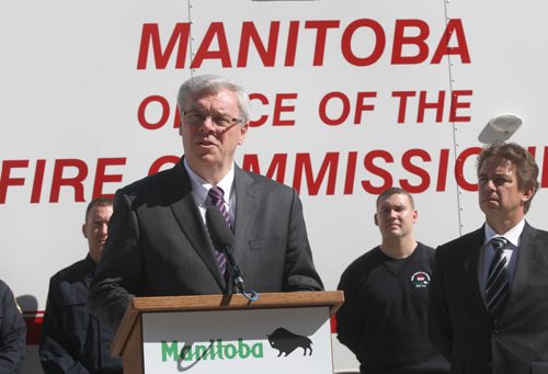 JOE.BRYKSA@FREEPRESS.MB.CA Local-( See Owen story)- Premier Greg Selinger today announced on the steps on the Manitoba Legislature that he will send the Manitoba Office of the Fire Commisioner to assist homeowners and cottagers to return to their propertioes in the RM's of St Laurent and Woodlands  JOE BRYKSA/WINNIPEG FREE PRESS- June 16, 2011