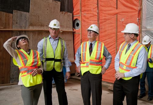 HADAS.PARUSH@FREEPRESS.MB.CA - Governor General David Johnston (right) surveys construction on the Canadian Museum for Human Rights with his wife Sharon (far left). Their Excellencies received a tour of the site led by construction manager Todd Craigen (left) and President and CEO of the museum, Stuart Murray (far right). HADAS PARUSH / WINNIPEG FREE PRESS, JUNE 17, 2011. CMHR