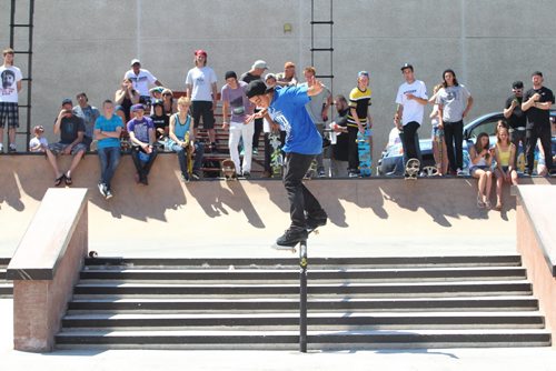 Brandon Sun 18062011 RDS skater Micky Papa attacks the six-stair rail during a demo at the Grand Opening of the Kristopher Campbell Memorial Skate Plaza in Brandon on a hot Saturday afternoon. (Tim Smith/Brandon Sun)