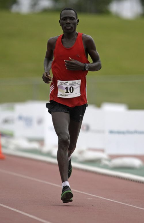 TREVOR HAGAN / WINNIPEG FREE PRESS - Philip Samoei, winner of this years Full Marathon, approaching the finish line at the University of Manitoba. 11-06-19
