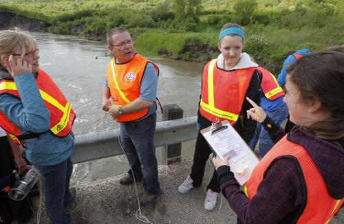BORIS.MINKEVICH@FREEPRESS.MB.CA   BORIS MINKEVICH / WINNIPEG FREE PRESS 110616 Students from Nellie McClung Collegiate participate in the River Watch program in which they take water samples from various rivers in south western Manitoba. Rose Sanders (fixing hair), Kent Lewarne (old guy without much hair!!!) Lexi Hacault (blue headband) Avery Baloun (finger wag)