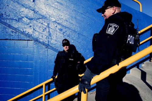 CHRISTOPHER PIKE/WINNIPEG FREE PRESS Winnipeg police officers stand in Canad Inns Stadium prior to the BC Lions vs. Montreal Alouettes in the 94th Grey Cup at Canad Inns Stadium in Winnipeg, Man. on Sunday Nov. 19, 2006.