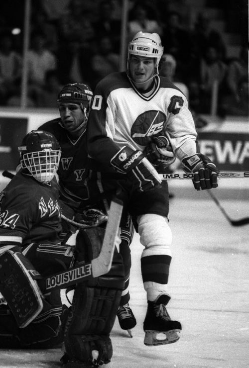 Winnipeg Free Press / Phil Hossack / Nov 8 1985 - Jets  Captian Dale Hawerchuk  in  front of New York Rangers  goalie #34 - Photo Book Project - Wpg Winnipeg Jets Hockey Club - NHL National Hockey League return -  ( kgjets brings up all Wpg Jets recovered photos in Merlin new book project pics will have slug newjets ( 147 new photos added June 2011  -  for archive pics put in after june 7 2011) - ***These next Photos slugged newjets2 for photos afterJune 14 20011 )  photos cannot be  published without written permission from the Winnipeg Free Press and credit must include  the Winnipeg Free Press and photographer with each photo -