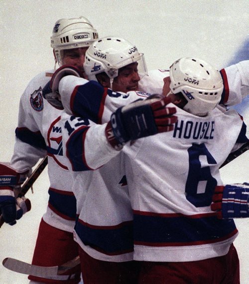 Winnipeg Free Press / Phil Hossack / March 2 93 - GOOD  COLOUR -and Quality   -Jets Teemu Selanne scores 3 times  to break Mike Bossy's  rookie record of 53 goals , Selanne would  score 76 goals and get 132 points winning the Calder Cup for Rookie of the year - NHL Record point record - in pic Phil Housley and Thomas Steen celebrate  record goal   - Photo Book Project - Wpg Winnipeg Jets Hockey Club - NHL National Hockey League return -  ( kgjets brings up all Wpg Jets recovered photos in Merlin new book project pics will have slug newjets ( 147 new photos added June 2011  -  for archive pics put in after june 7 2011) - ***These next Photos slugged newjets2 for photos afterJune 14 20011 )  photos cannot be  published without written permission from the Winnipeg Free Press and credit must include  the Winnipeg Free Press and photographer with each photo -