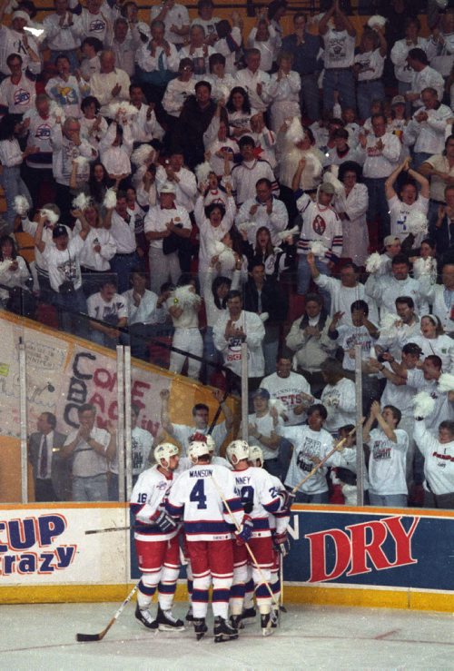 Winnipeg Free Press / Boris Minkevich / April 21 1996 - Jets player celebrate plyoff , white out goal vs Detroit Red Wings   - Photo Book Project - Wpg Winnipeg Jets Hockey Club - NHL National Hockey League return -  ( kgjets brings up all Wpg Jets recovered photos in Merlin new book project pics will have slug newjetoris hotos slugged newjets2 for photos afterJune 14 20011 )  photos cannot be  published without written permission from the Winnipeg Free Press and credit must include  the Winnipeg Free Press and photographer with each photo -