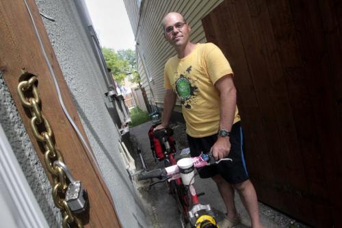 MIKE.DEAL@FREEPRESS.MB.CA 110628 - Tuesday, June 28, 2011 -  David Wieser started the valet concierge service for bikes called BicycleValetWinnipeg.ca recently and just a couple days ago two of his bicycles were stolen out of his backyard. One was the one he used to haul the equipment for his bike stands. He has since upgraded his lock on his backyard gate. MIKE DEAL / WINNIPEG FREE PRESS