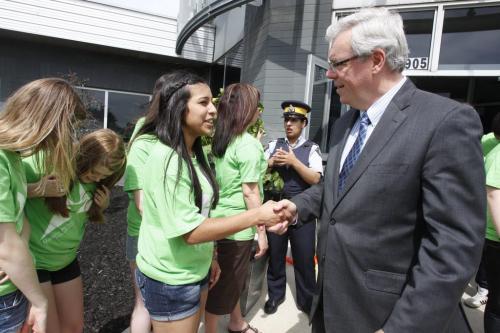 BORIS.MINKEVICH@FREEPRESS.MB.CA   BORIS MINKEVICH / WINNIPEG FREE PRESS 110629 Mentoring Youth press conference at Stantec. Greg Selinger shakes hands with Richa Soni, a student that was at the event.