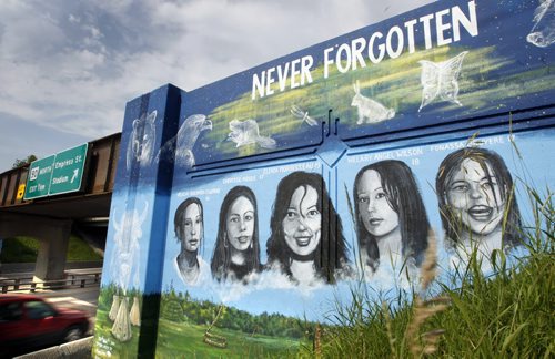 A  mural on the rail bridge over Portage Ave. near Polo Park by artist Tom Andrich depicts murdered Manitoba Aboriginal women and another mural on the south side of Portage Ave. shows portraits of missing Manitoba Aboriginal women, the murals will be officially unveiled Thursday June 30. (WAYNE GLOWACKI/WINNIPEG FREE PRESS) Winnipeg Free Press June 30  2011