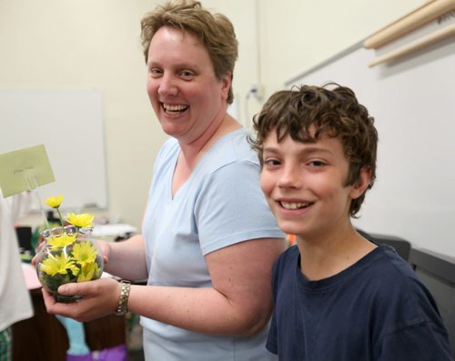 Quinn smiles after giving his Grade six  Windsor School teacher Colleen Neil  a gift on the last day of School Thursday.  Story by Carolin Vesley, 2017 feature. June 29, 2011 (RUTH BONNEVILLE / WINNIPEG FREE PRESS)