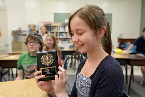 Grade six Windsor School student Sydney is all smiles after recieving the Marion & Dean Finlay Citizenship Award on their last day of school Thursday.  Story by Carolin Vesley, 2017 feature. June 29, 2011 (RUTH BONNEVILLE / WINNIPEG FREE PRESS)