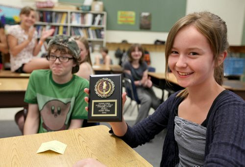 Grade six Windsor School student Sydney is all smiles after recieving the Marion & Dean Finlay Citizenship Award on their last day of school Thursday.  Story by Carolin Vesley, 2017 feature. June 29, 2011 (RUTH BONNEVILLE / WINNIPEG FREE PRESS)