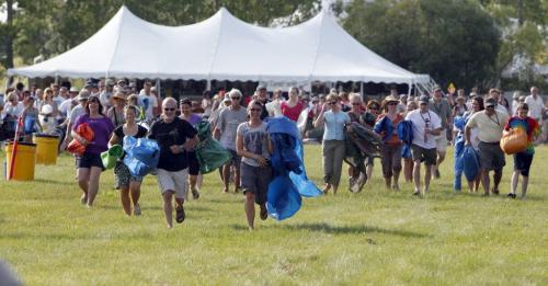 Winnipeg Folk Festival 2011. The tarp walk. This is where people walk to stake their spot on the ground in front of the stage. Rob Williams story. July 6, 2011 (BORIS MINKEVICH / WINNIPEG FREE PRESS) 110706
