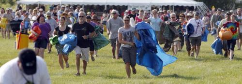 Winnipeg Folk Festival 2011. The tarp walk. This is where people walk to stake their spot on the ground in front of the stage. Rob Williams story. July 6, 2011 (BORIS MINKEVICH / WINNIPEG FREE PRESS) 110706