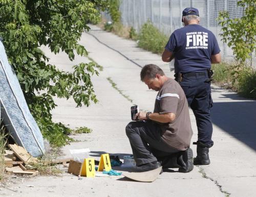 166 Mighton. Scene of a possible firebombing. Police and fire investigate. July 12, 2011 (BORIS MINKEVICH / WINNIPEG FREE PRESS)