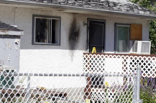 166 Mighton. Scene of a possible firebombing. Police and fire investigate. July 12, 2011 (BORIS MINKEVICH / WINNIPEG FREE PRESS)