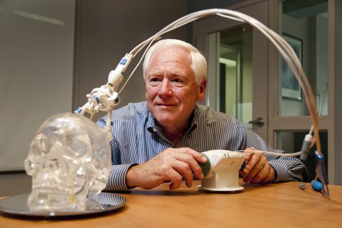 Jim Duncan of Monteris Medical, Inc., with a device demonstrating the Winnipeg company's technology of zapping deep-seated brain tumours with a laser. July 13, 2011 (HADAS PARUSH / WINNIPEG FREE PRESS)