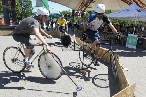 (L to R) Dave Meagher, Aren Fry, and Eryn Maloney of the Winnipeg Bike Polo Association play bike polo at the third annual Bikefest sponsored by MEC at The Forks in Winnipeg, Saturday, July 16, 2011.  John Woods/Winnipeg Free Press