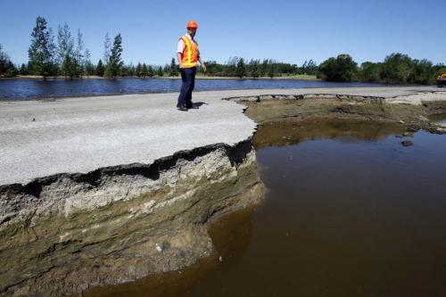 Director of regional operations for Manitoba Infastructure and transportation for southwest Manitoba Herb Mahood damage on Highway 21, Hartney, Manitoba, southwest of Souris, Manitoba. - . July 21, 2011 (BORIS MINKEVICH / WINNIPEG FREE PRESS)