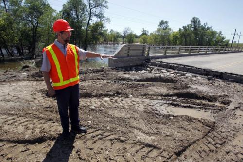 Director of regional operations for Manitoba Infastructure and transportation for southwest Manitoba Herb Mahood damage on Highway 21, Hartney, Manitoba, southwest of Souris, Manitoba. - . July 21, 2011 (BORIS MINKEVICH / WINNIPEG FREE PRESS)