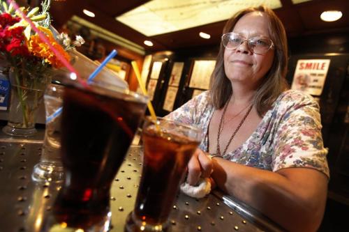 Debbie Slota serves beverages at the LaSalle Hotel in Winnipeg, Friday, July 22, 2011.  John Woods/Winnipeg Free Press