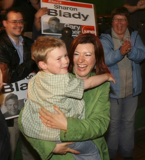 Ruth Bonneville/Winnipeg Free Press Election- NDP candidate Sharon Blady in the Kirkfield Park riding celebrates winning with her son Heiko 31/2 in her arms