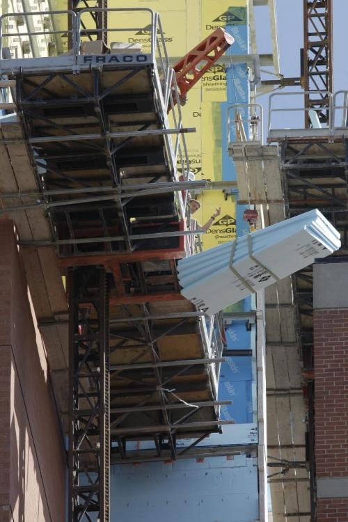 Crews work on construction of a new student residence at the University of Manitoba in Winnipeg, Thursday, July 28, 2011.  John Woods/Winnipeg Free Press