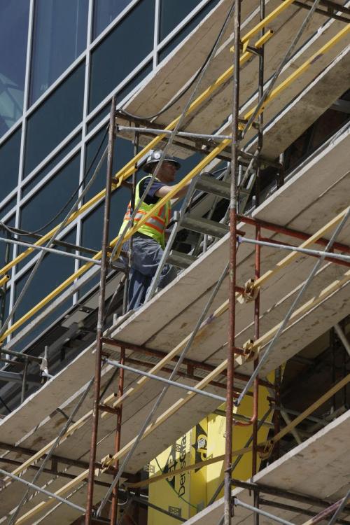 Crews work on construction of a new student residence at the University of Manitoba in Winnipeg, Thursday, July 28, 2011.  John Woods/Winnipeg Free Press