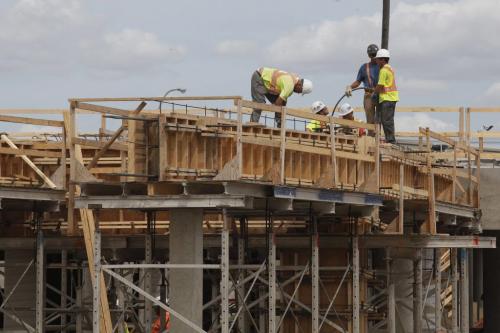 Crews work on construction of the new stadium at the University of Manitoba in Winnipeg, Thursday, July 28, 2011.  John Woods/Winnipeg Free Press