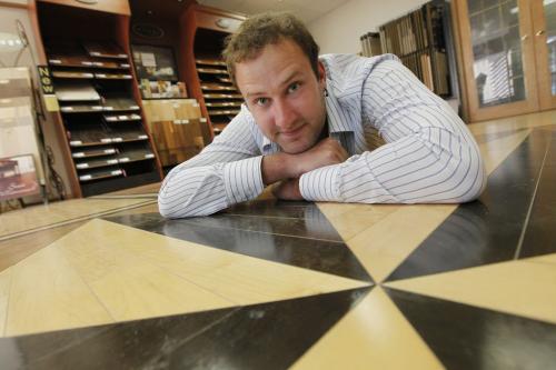 Graham Hawryluk, president of Meticulous Wood Flooring, poses for a photograph in his business Friday, July 29, 2011.  Hawryluk has been nominated for young entrepreneur awards. John Woods/Winnipeg Free Press