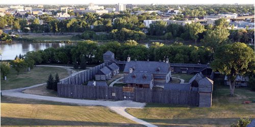 Stdup - a perfect day  for  a Sundance balloon tour tour at dawn over the  Winnipeg city skyline Fort Gibraltar - located at Whittier Park St. Boniface  historic fort , a replica of the  1815 North West Company fur trading fort built on the banks of the Red River . The replica fort was built in  the 1970's asa living history museum and  is used  to  host Festival du Voyageur  ( KEN GIGLIOTTI  / WINNIPEG FREE PRESS ) July 31 2011 -