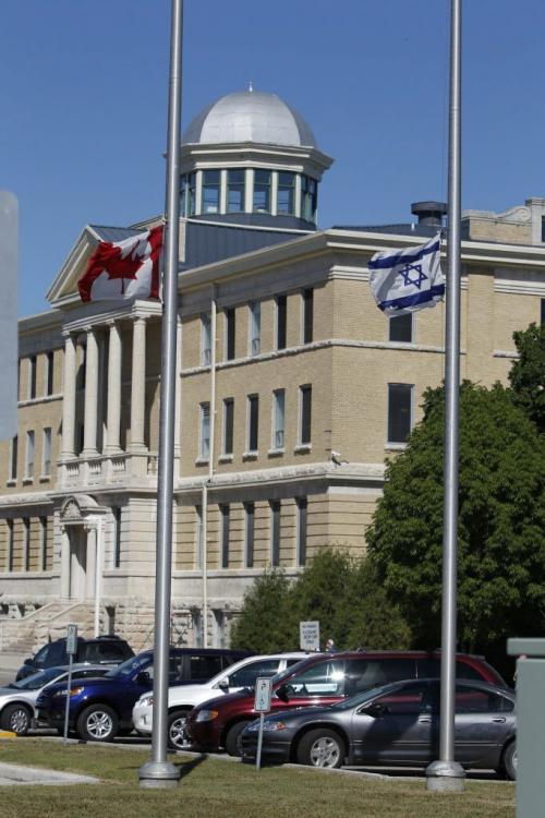 Flags fly at half mast at the Asper Jewish Community Campus. Ruth Miriam (Babs) Asper, one of the great philanthropic leaders in this country, died suddenly July 30, 2011, at St. Boniface Hospital. August 2, 2011 (BORIS MINKEVICH / WINNIPEG FREE PRESS)