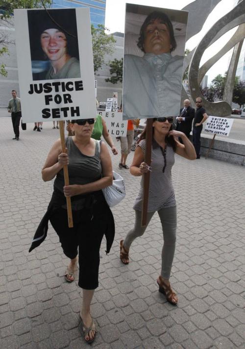 Protest at the Law Courts. People not happy about child killers. August 4, 2011 (BORIS MINKEVICH / WINNIPEG FREE PRESS)