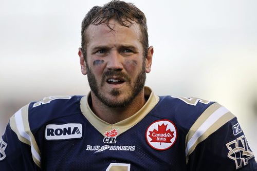 Bombers' Buck Pierce catches his breath after scrambling for a TD late in the first half against the Eskimos. (TREVOR HAGAN/WINNIPEG FREE PRESS)