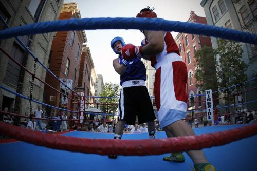 James Hunt (Blue) and Sebastion Jagnyzak (Red) box in the first annual Take It Outside boxing event on Arthur Street in downtown Winnipeg Saturday, August 6, 2011.  The event is a fund raiser for disadvantaged youth at Pan Am Place. John Woods/Winnipeg Free Press