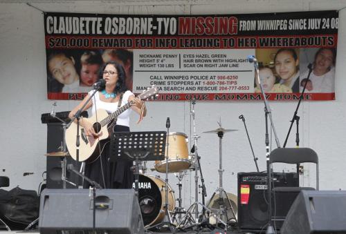 Missing women concert. To bring more awareness to the issue of violence against women and missing and murdered women across canada. Andrea Dunning performs to the crowd. August 7, 2011 (BORIS MINKEVICH / WINNIPEG FREE PRESS)
