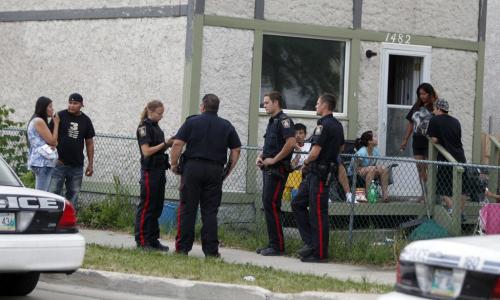 Stabbing scene near 1482 Bannatyne Avenue West. August 7, 2011 (BORIS MINKEVICH / WINNIPEG FREE PRESS)