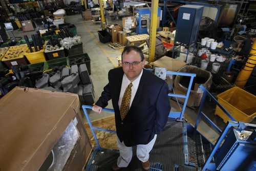 Craig McIntosh, president and CEO of Acrylon Plastics poses for a photo inside the factory. August 9, 2011 (BORIS MINKEVICH / WINNIPEG FREE PRESS)