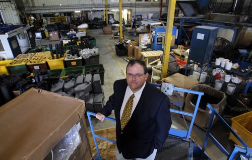 Craig McIntosh, president and CEO of Acrylon Plastics poses for a photo inside the factory. August 9, 2011 (BORIS MINKEVICH / WINNIPEG FREE PRESS)