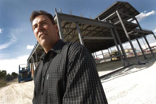 John Pearson of Shindico on site of a new Swiss Chalet restaurant being built in the commercial retail complex at the corner of Kenaston and MacGillivray in Winnipeg Thursday, August 11, 2011.  John Woods/Winnipeg Free Press