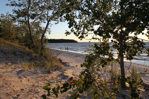View of the shores of Grand Beach from the sand dunes as the sun sets on the August long weekend   2011 (RUTH BONNEVILLE / WINNIPEG FREE PRESS)