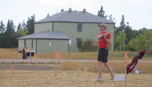 Brandon Sun Donald Smith of Winnipeg, tees off on the fourth hole of the re-created nine-hole golf course, thought to one of the first in Manitoba, at the Criddle/Vane Homestead heritage park on Sunday afternoon. (Bruce Bumstead/Brandon Sun)