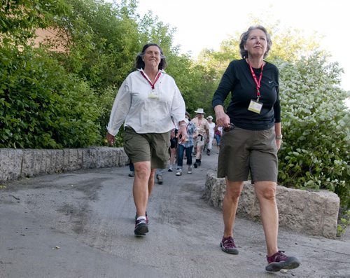 Leone Banks (left) and Wendy Wilson (right) are taking a group of adventurous members of the Prairie Pathfinders for a brisk walk on the Churchill Parkway. Banks and Wilson are leaders of the Prairie Pathfinders, a walking group dedicated to discovering Winnipeg's trails and pathways.   Story by SHamona Harnett. August 16, 2011 (HADAS PARUSH / WINNIPEG FREE PRESS)