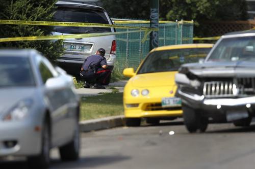 Police investigate a fatal dispute that occurred in the early morning in the 1000 block of Garfield in Winnipeg's West End Saturday, August 20, 2011. Six people were taken to hospital and one has succumbed to their injuries.  John Woods/Winnipeg Free Press
