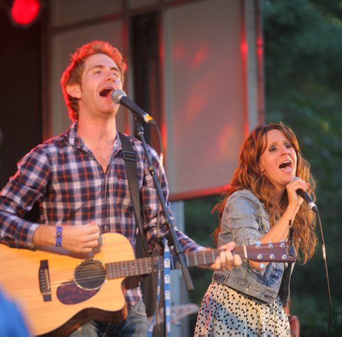 Brandon Sun Keith Macpherson and Renee Lamoureux, better known as Keith and Renee, perform on stage at Saturday's Mega Music Concert at Clear Lake during Parks Canada's centinnial concert series in Wasagaming. (Bruce Bumstead/Brandon Sun)