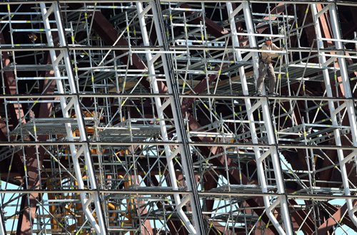 A construction worker erects a menagerie of scaffolding at the 310 Million dollar Canadian Museum for Human Rights under construction at the Forks in Winnipeg-The Museum is planned to be completed in 2012- Standup photo August 29, 2011   (JOE BRYKSA / WINNIPEG FREE PRESS) CMHR