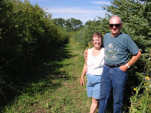 Irma and Carlyle on a trail through a young forest they planted.  Bill Redekop / Winnipeg Free Press