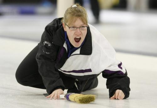 John Woods / Winnipeg Free Press / December 12, 2006 - 061212  - Tracey Andries curls at the Asham Curling Club Sunday Dec 12/06.